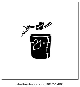 Tea caddy glyph icon. Special box for traditional herbal tea.Japanese ethnic and national ceremony. Sakura twig. Tea ceremony concept.Isolated vector illustration