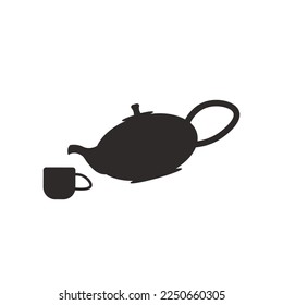 Tea ceremony. Teapot and cups or ceramic mugs with tea. Beautiful Japanese ceramic tableware.
