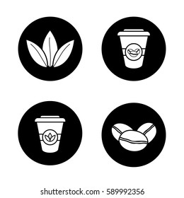 Tea and coffee icons set. Roasted coffee beans, tea leaves and disposable paper cups. Vector white silhouettes illustrations in black circles