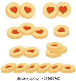 Tea cookies groups with heart of red marmalade on white