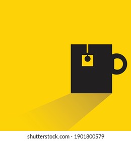 tea cup with drop shadow on yellow background