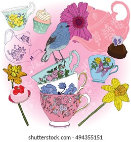 Tea cup set with flowers , teapot , bird  and cookies