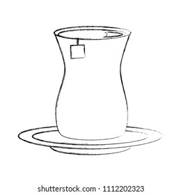 tea cup with teabag beverage on dish