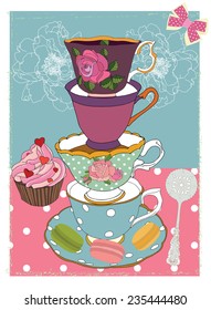 Tea cups with cupcake and floral and polka background