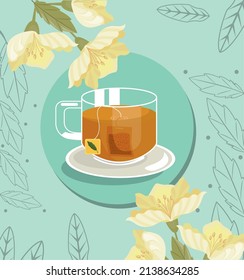 tea glass and chamomile flower