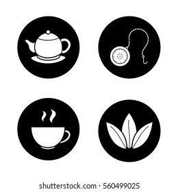 Tea icons set. Steaming cup, teapot on plate, loose tea leaves and ball infuser. Vector white silhouettes illustrations in black circles