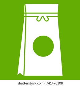 Tea packed in a paper bag icon white isolated on green background. Vector illustration