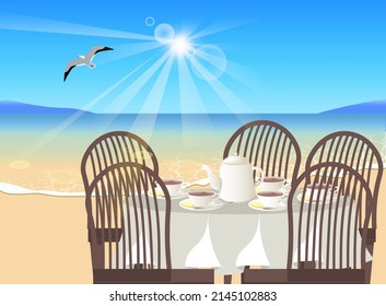 Teeparty mit Zitronenfrühstück auf den Sand-Stühlen Korbholztisch aus Korbgeflecht mit Tischdecke Teekocher, die Seetuchfliegen in den Himmelsrochen der Sonnenseeschaum-Wellness-Erholung am Ozean enthält e