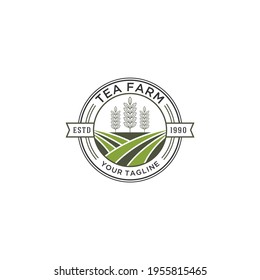 tea plantation logo with the addition of tea leaves that still have a stalk