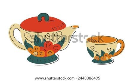 Tea set. Colorful teapot and mug. Floral ornament. Decorative tableware. Items that make the house cozy