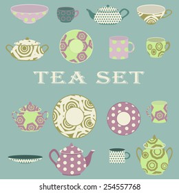 Tea set with teacups, teapots, saucers on blue background.