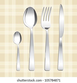 Tea spoon, spoon, fork and knife against from the Scots background. Isolated. Grouped for easy editing.