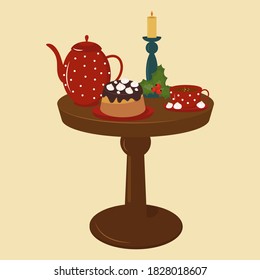 Tea time. Chocolate cake with marshmallows, teapot, cup of tea and candlestick with holly leaves. 