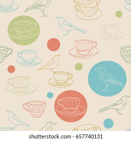 Tea time. Seamless background with teacups and birds. Vector illustration.