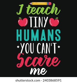 I teach tiny humans you can't scare me elementary school teachings typography tshirt design