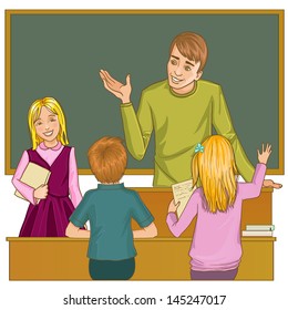 Teacher at blackboard in classroom with children
