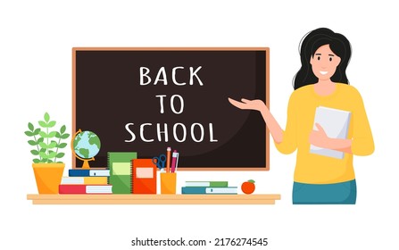Teacher at blackboard. School and learning concept, back to school.