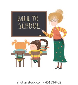 Teacher by blackboard with pupils