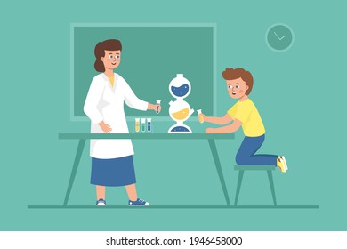 A Teacher And A Child Conduct A Chemical Experiment Together. A Science Test In The School's Lab.