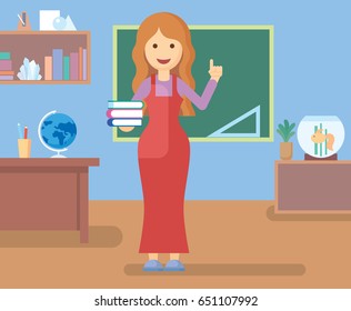 Teacher in class room. Teacher on lesson. The teacher at blackboard.