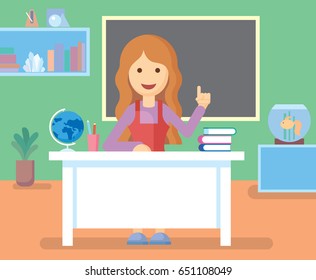 Teacher in class room. Teacher on lesson. The teacher at blackboard.