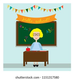 The teacher in the classroom sittting near the blackboard. Card for Teacher s day or Knowledge day