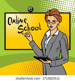 The teacher conducts an online lesson at school. Young woman business coach on computer monitor makes online training presentation. Business training on internet. Marketing strategy presentation