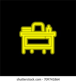 Teacher desk yellow glowing neon ui ux icon. Glowing sign logo vector