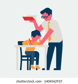 Teacher helps shcoolchild with classwork showing solution whist holding a book. Teacher leans over student sitting behind desk to check his work