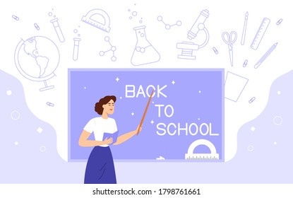 The teacher points with a pointer to the inscription "back to school" on the board. School supplies are on the background
