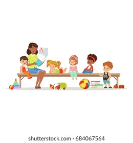 Teacher reading a book to kids while sitting on a bench, childrens education and upbringing in preschool or kindergarten, colorful characters