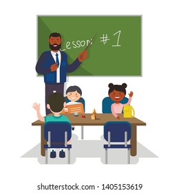 Teacher Stand at Blackboard. First School Lesson. Teacher and Students on White Background. Kids at School. Vector Illustration. Primary School Teacher. Classroom Interior. Children Sit at School Desk