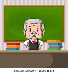 The teacher standing at the back of the desk with a lot of the book
