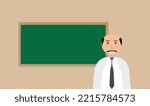 Teacher standing in front of the blackboard