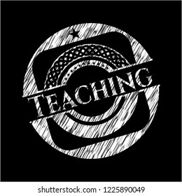 Teaching chalkboard emblem on black board