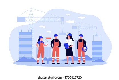 Team of builders onsite. Female engineer, architect, technician, worker in overalls holding tools, discussing work. Can be used for construction site, engineering, teamwork concept