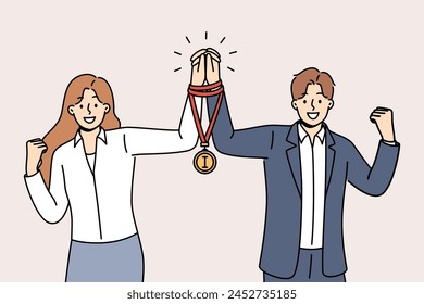 Team business man and woman together received winners medal for excellent work on assigned tasks. Union or team of office employees leads to victory and trophy in professional skills competition