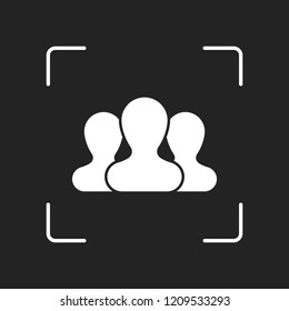 Team, few person. White object in camera autofocus on dark background