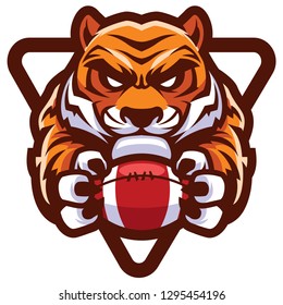 Team mascot with determined tiger holding American football ball.