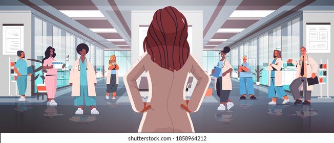 team of mix race doctors in uniform discussing during meeting in hospital corridor medicine healthcare concept horizontal full length vector illustration