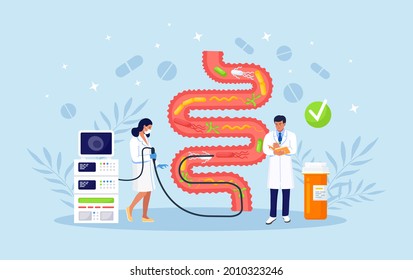 Team of physicians performs colonoscopy, diagnostics of the intestine. Bowel health. Tiny medical doctors examining gastrointestinal tract and digestive system. Gut microorganisms and friendly flora