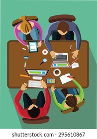Team work concept. People siting from the table top view.