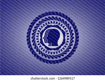 team work icon inside badge with denim background