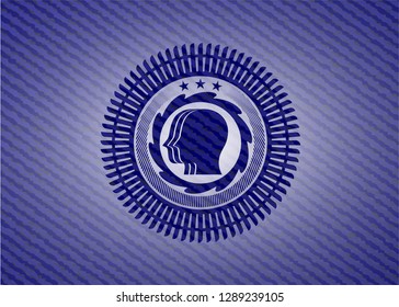 team work icon inside badge with denim texture