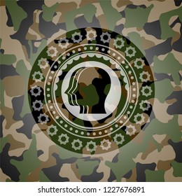 team work icon inside camouflage emblem