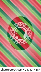icono de trabajo en equipo dentro de la insignia de los colores de Navidad.