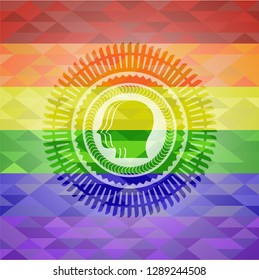 team work icon inside emblem on mosaic background with the colors of the LGBT flag