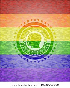 team work icon inside emblem on mosaic background with the colors of the LGBT flag