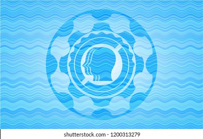 team work icon inside light blue water wave style emblem.