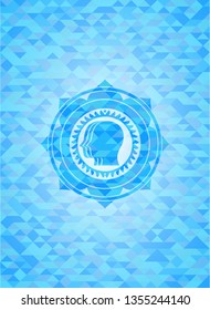 team work icon inside light blue mosaic emblem
